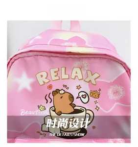 Pink waterproof nylon kids backpack detail with cute capybara print and RELAX text