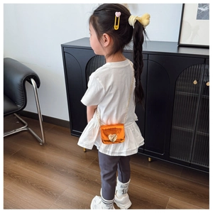 Toddler girl mini orange crossbody bag with gold heart clasp and stylish chain strap