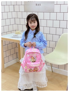 Pink Capybara school backpack for kids with 'RELAX' print and front zipper pocket