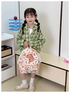 Detail of high-capacity school backpack featuring cute Capybara cartoon prints for kids