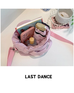 Pink drawstring bucket bag interior showing spacious storage for daily essentials