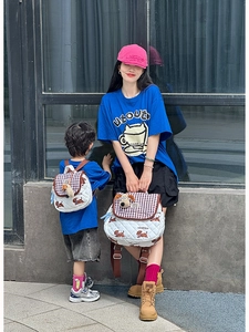 Quilted parent-child backpack set with cartoon dog patterns and plush doll charm