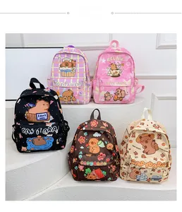 Five capybara themed backpacks in purple, pink, black, brown, and cream white displayed in a row