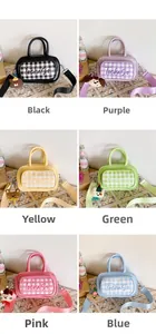 Detail of six mini plaid crossbody bags in pastel colors with cartoon charms