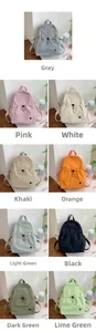 Multiple colors of large capacity school backpacks with drawstring front pockets for students