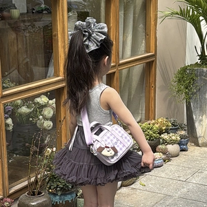 Kids purple plaid crossbody bag with puppy charm and silver glitter hair tie accessory