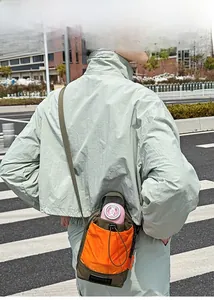 Sac bandoulière extérieur en nylon vert et orange avec cordon de serrage réglable