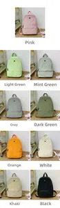 Canvas kids backpack shown in nine colors including pink, green, and black variations
