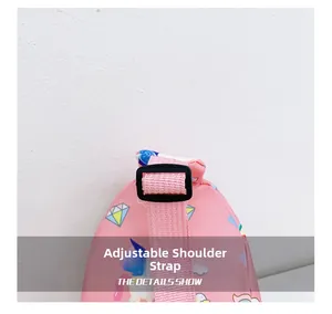 Detail view of the pink unicorn bag featuring an adjustable strap with a black buckle