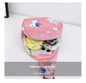Detail view of the pink unicorn chest bag interior showing space for a phone and notepad