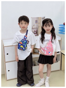 Children's crossbody chest bags with colorful dinosaur and unicorn prints shown on models