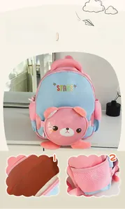 Vue détaillée de l'intérieur multi-compartiments et des rangements du sac à dos enfant
