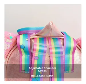 Detail of pink sequin backpack showing adjustable rainbow straps and star print