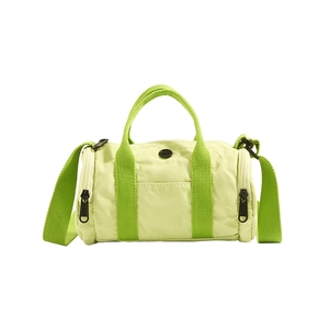 Green color block cylinder bag for kids with adjustable strap and top handles