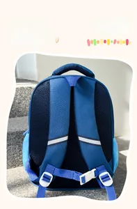 Detail of breathable honeycomb mesh back panel and reflective safety straps on blue backpack