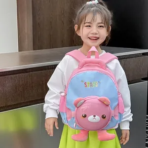 Sac à dos enfant bicolore rose et bleu avec poche ours 3D et imprimé STARS