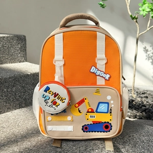 Detail of cartoon excavator backpack with side pocket and matching round coin purse