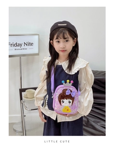 Detail of purple sequin girls crossbody bag with cute crown cartoon girl design