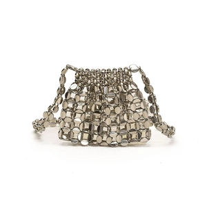 Silver metallic sequin woven crossbody bag with drawstring closure for fashion evening use