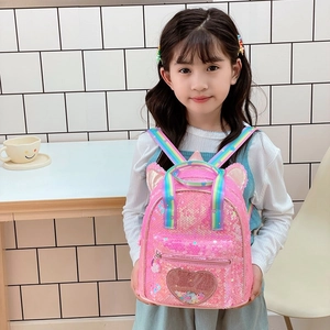 Pink sequin kids backpack with rainbow straps and heart-shaped glitter compartment