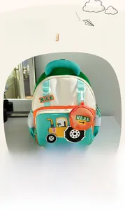 Detail view of cartoon tractor backpack with mesh side pocket and spacious inner compartments
