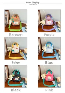 Detailed grid view of mini crossbody bags with colorful heart patterns and plush charms