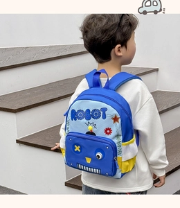 Detail of cute robot cartoon backpack with blue patchwork and side mesh water bottle pocket