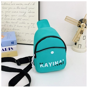 Detail of lightweight cyan kids chest bag with KAYINAI lettering and zipper pocket