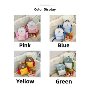 Color display of four kids' color-block backpacks with mountain logo for school