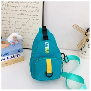 Blue canvas chest bag for kids featuring a yellow strap and white letter print