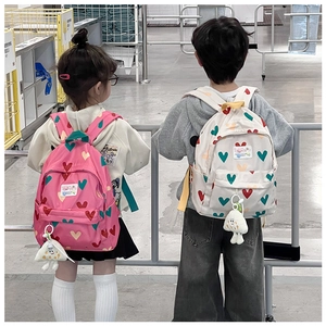 Sac à dos enfant motif cœurs en rose et beige avec charm fantôme mignon inclus