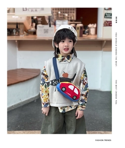 Toddler car-shaped crossbody bag styled with vintage vest and floral shirt outdoors