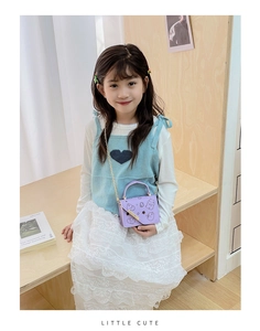 Detail of purple mini crossbody bag for kids with cute bear prints and gold chain strap