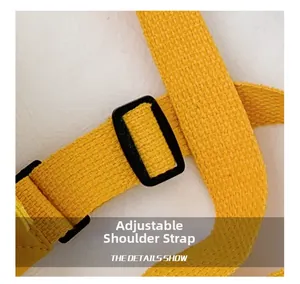 Detail of yellow canvas strap with adjustable black plastic buckle for kids bags