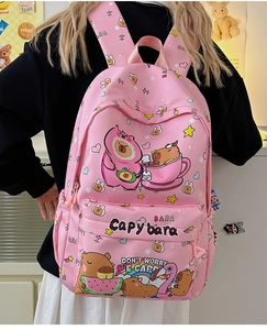 Detail of pink Capybara cartoon backpack showing cute prints and front zipper pocket