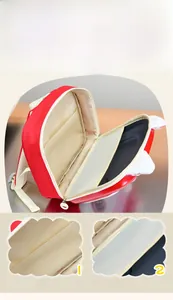 Internal compartments of kids cartoon backpack showing storage for toys and snacks