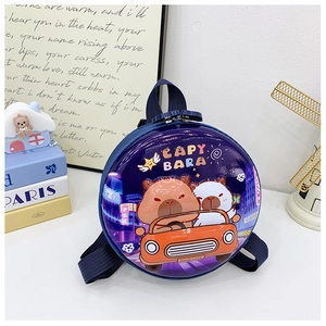 Detail shot of the durable hard shell Capybara backpack with glossy blue finish and art