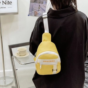 Kids yellow nylon chest bag with adjustable strap and contrast letters for casual sport