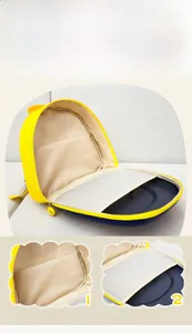 Detail view of the spacious inner mesh pocket and dual-layer storage of the kids backpack