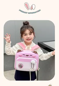 Girl wearing a cute pink kitten backpack with 3D ears and fish charm in a daily scene