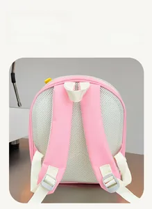Detail of the breathable honeycomb mesh back and adjustable straps on children pink backpack