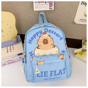 Detail of light blue canvas kids backpack with a cute cartoon capybara and donut print
