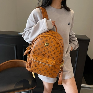 Brown leather fashion backpack with letter prints and mini coin purse charm for women