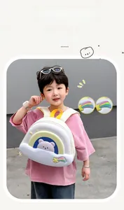 Close-up of lightweight kids backpack with glowing bear and rainbow cartoon pattern