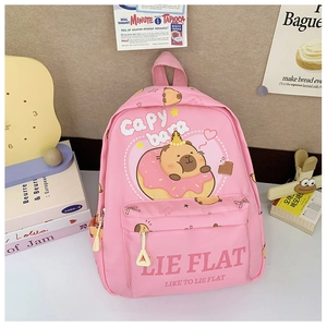 Detailed view of a pink Capybara backpack featuring a cute crown and donut print