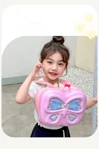 Toddler girl wearing pink 3D butterfly shell backpack with breathable straps outside