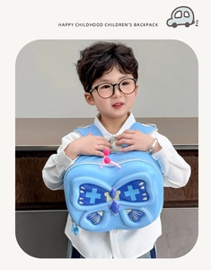 Detail of blue toddler butterfly backpack with lightweight 3D wing design and pink antennae
