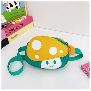 Close-up of the cute green mushroom-shaped kids waist bag with adjustable strap and zipper