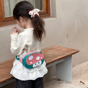 Cute mushroom-shaped kids waist bag in green and pink canvas with adjustable strap