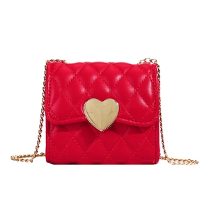 Red quilted crossbody bag with golden heart clasp and metal chain strap for girls